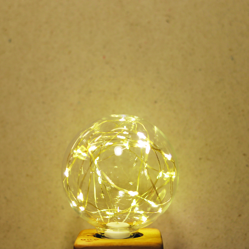 Ampoule 95mm teinte chaude paillettes blanches